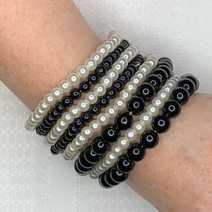 set of elastic plastic bead bracelets